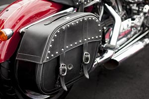 Vintage Leather Saddlebag on Red Motorcycle