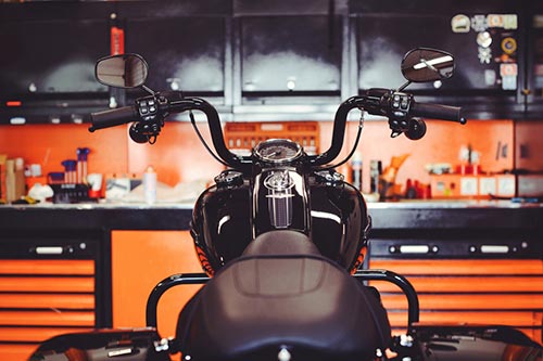 Motorcycle wheel with disc lock securing it