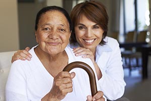 An older adult with caregiver